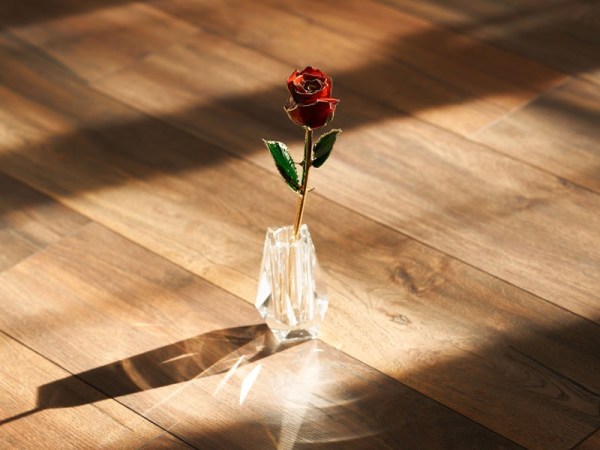Gold dipped rose in crystal vase